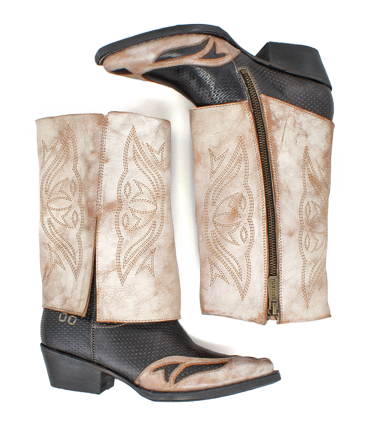 A pair of Blind boots by Bed|Stü, handcrafted with brown suede shafts adorned with embroidered patterns, black textured foot areas, easy-access zippers, and low heels.