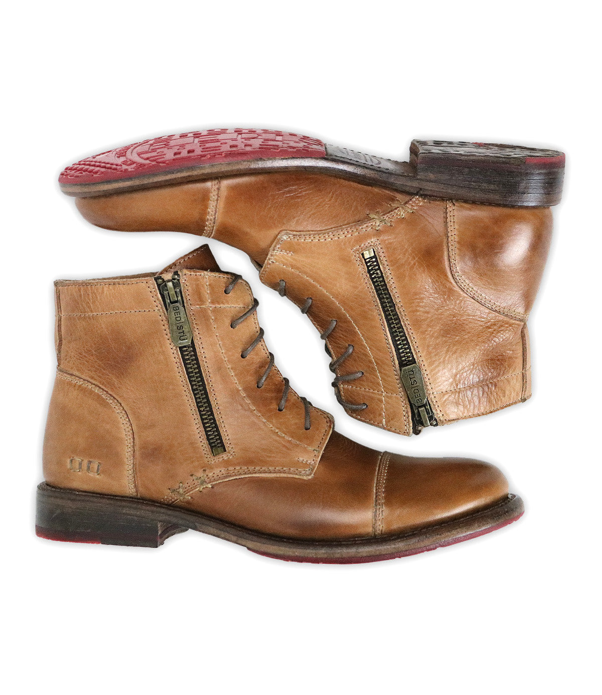 The Bonnie II by Bed|Stü is a pair of tan leather combat ankle boots featuring laces, cap toe detailing, side zippers, and red rubber soles, displayed from the side and bottom views on a white background.