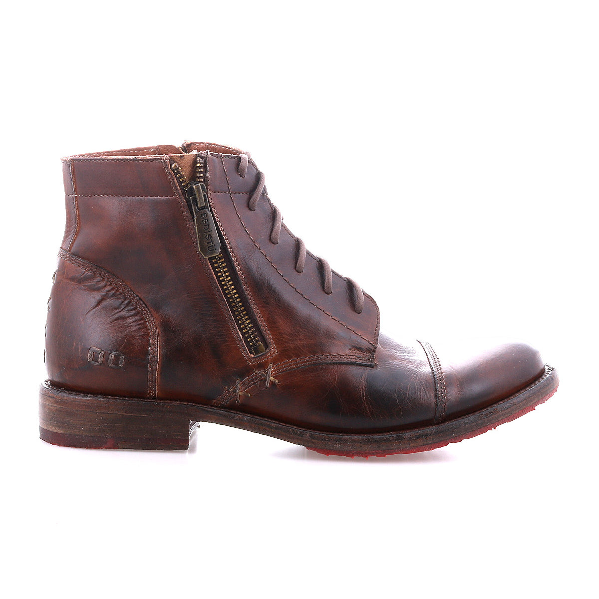 The Bed|Stü Bonnie II is a brown leather combat ankle boot featuring a cap toe, visible stitching, side zipper, laces, and a worn Goodyear-welted outsole, displayed in a left-side profile view on a white background.