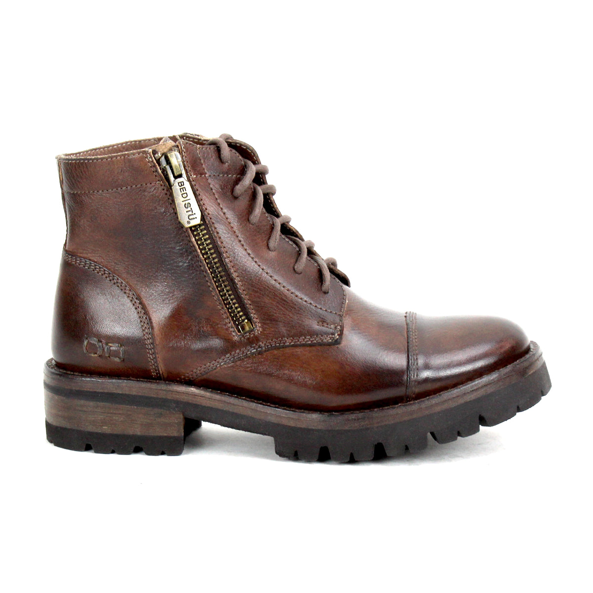 Bed|Stü’s Bonnie IV is a brown leather lace-up ankle combat boot, designed with dual side zippers for a secure fit, a low stacked heel, and a thick textured sole, displayed in a left side profile view.