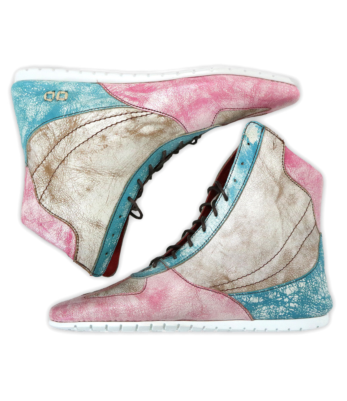 A pair of Bed|Stü Breath high-top sneakers crafted in multi-tone leather—featuring pink, blue, and beige panels, white soles, and black laces—displayed side by side; these statement shoes deliver bold style with a retro court-inspired edge.