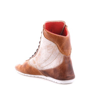 Bed|Stü Breath brown and white high-top retro court sneakers, featuring a red inner lining and crafted from multi-tone leather, shown from the back-left angle against a white background.
