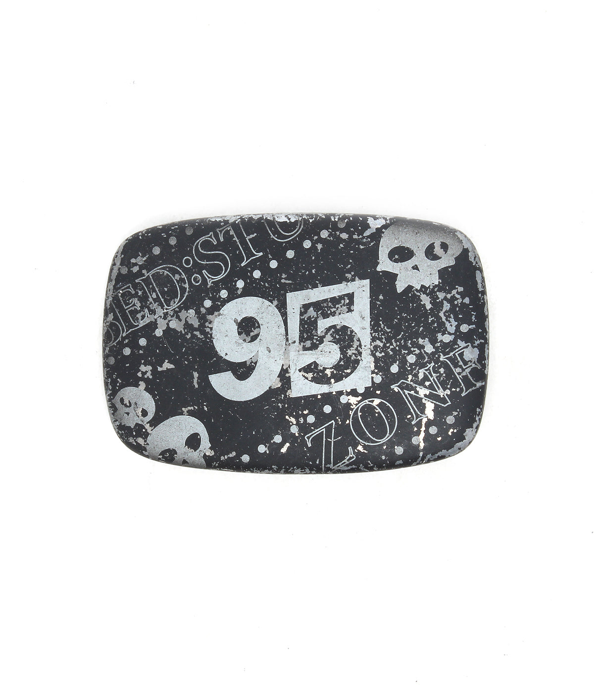 The Bed|Stü 95 Buckle is a rectangular black metal belt buckle with a distressed design, featuring the number "95," white skull graphics, and the partial words "ZONE" and "BEDSTO." This rugged accessory stands out with its unique weathered look.