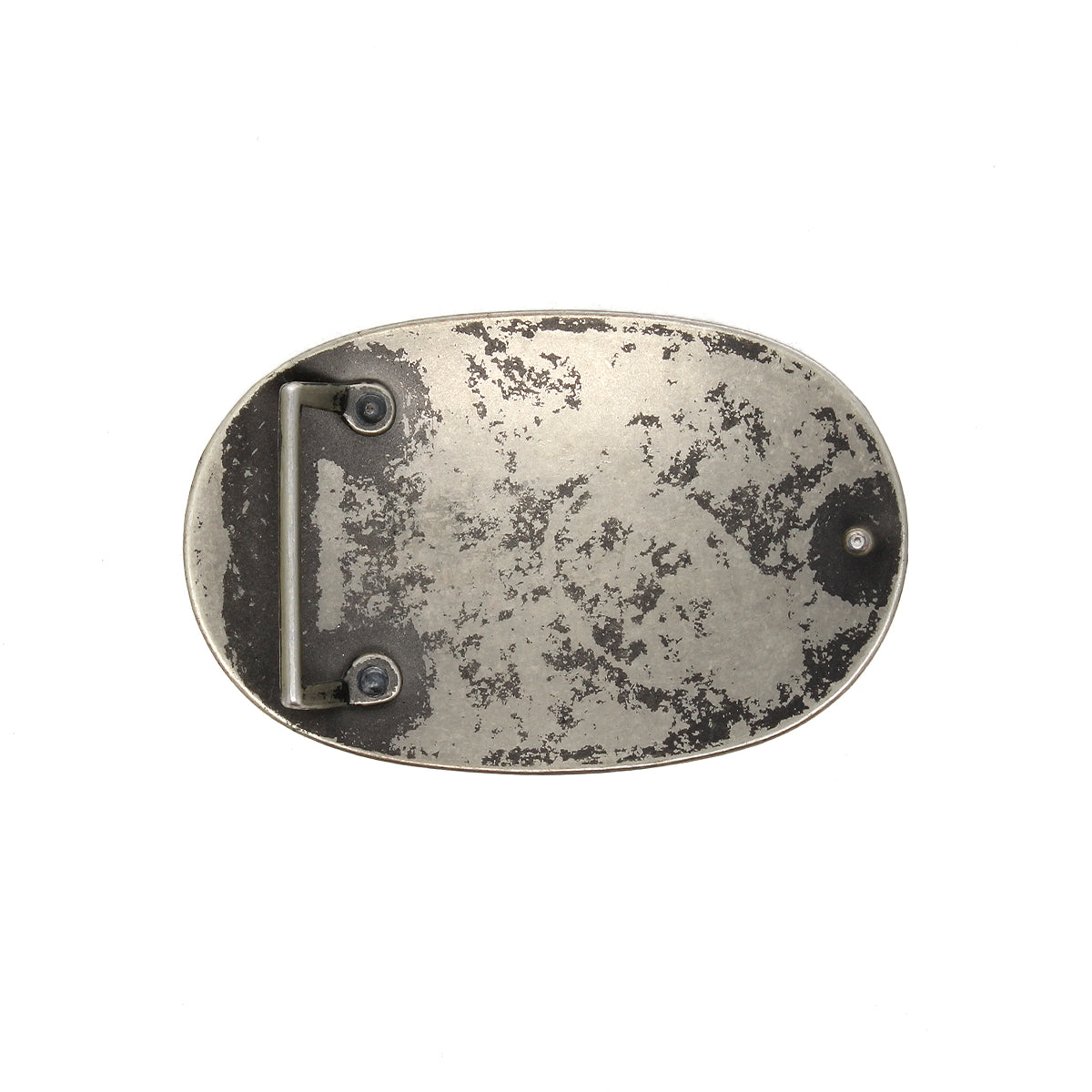 Bed|Stü’s Revolt Buckle features an oval shape in an aged silver-tone finish, showcasing a textured, worn surface and a straightforward fastening bar on the back.