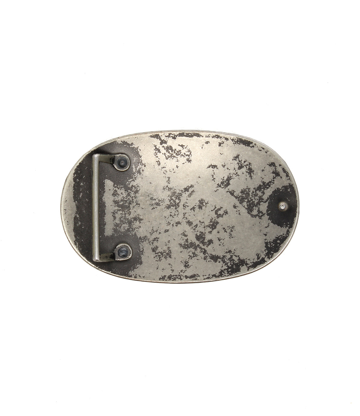 Bed|Stü’s Revolt Buckle features an oval shape in an aged silver-tone finish, showcasing a textured, worn surface and a straightforward fastening bar on the back.