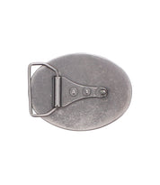 Introducing the Bed|Stü Tribe Buckle: an oval-shaped silver Western belt buckle featuring a hinged pin and metal loop attachment, exuding rustic charm against a white background.