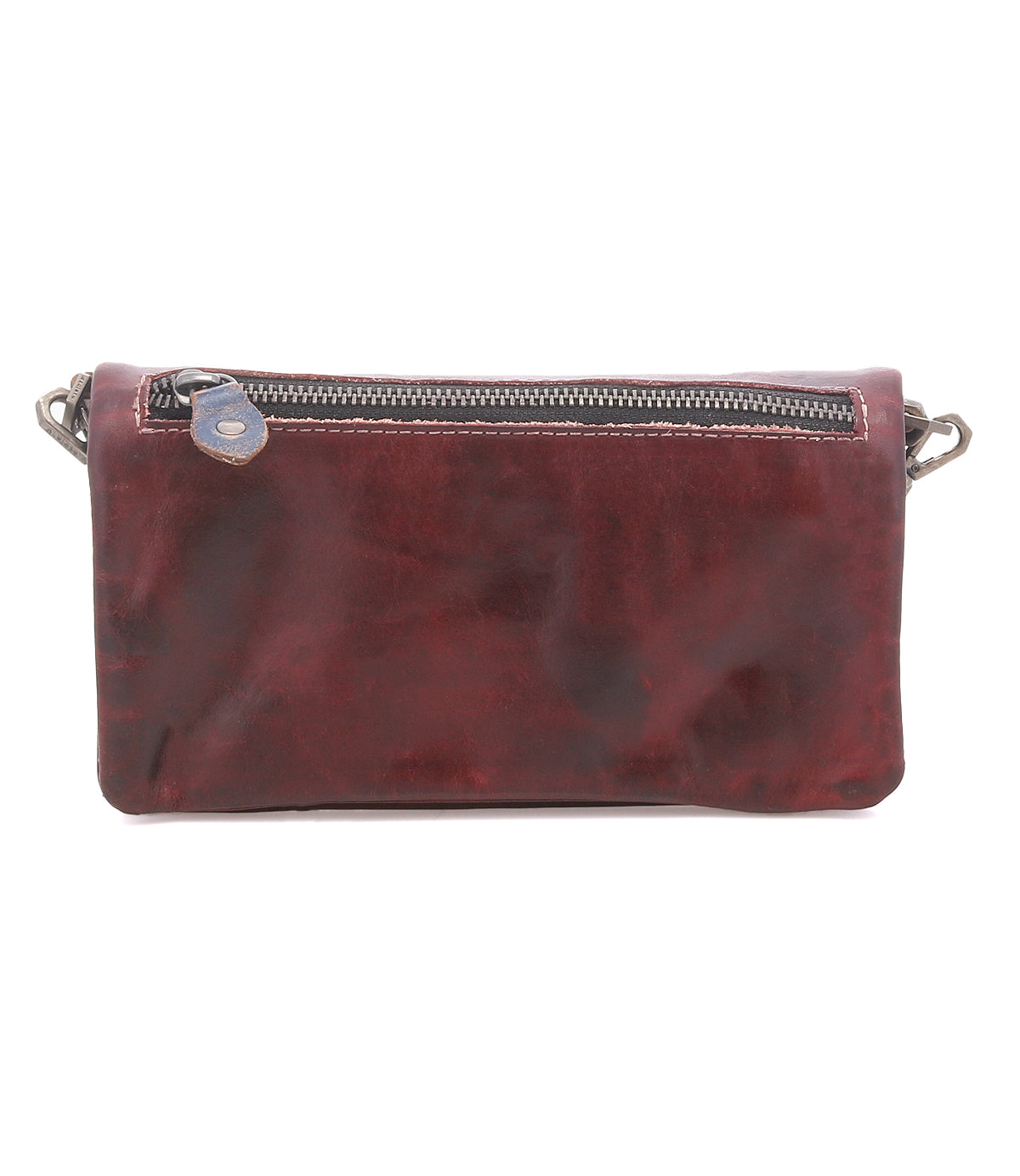The Cadence by Bed|Stü is a rectangular brown 3-in-1 pouch crafted from vegetable-tanned leather, showcasing a top zipper and metal hardware on each side, photographed against a white background.