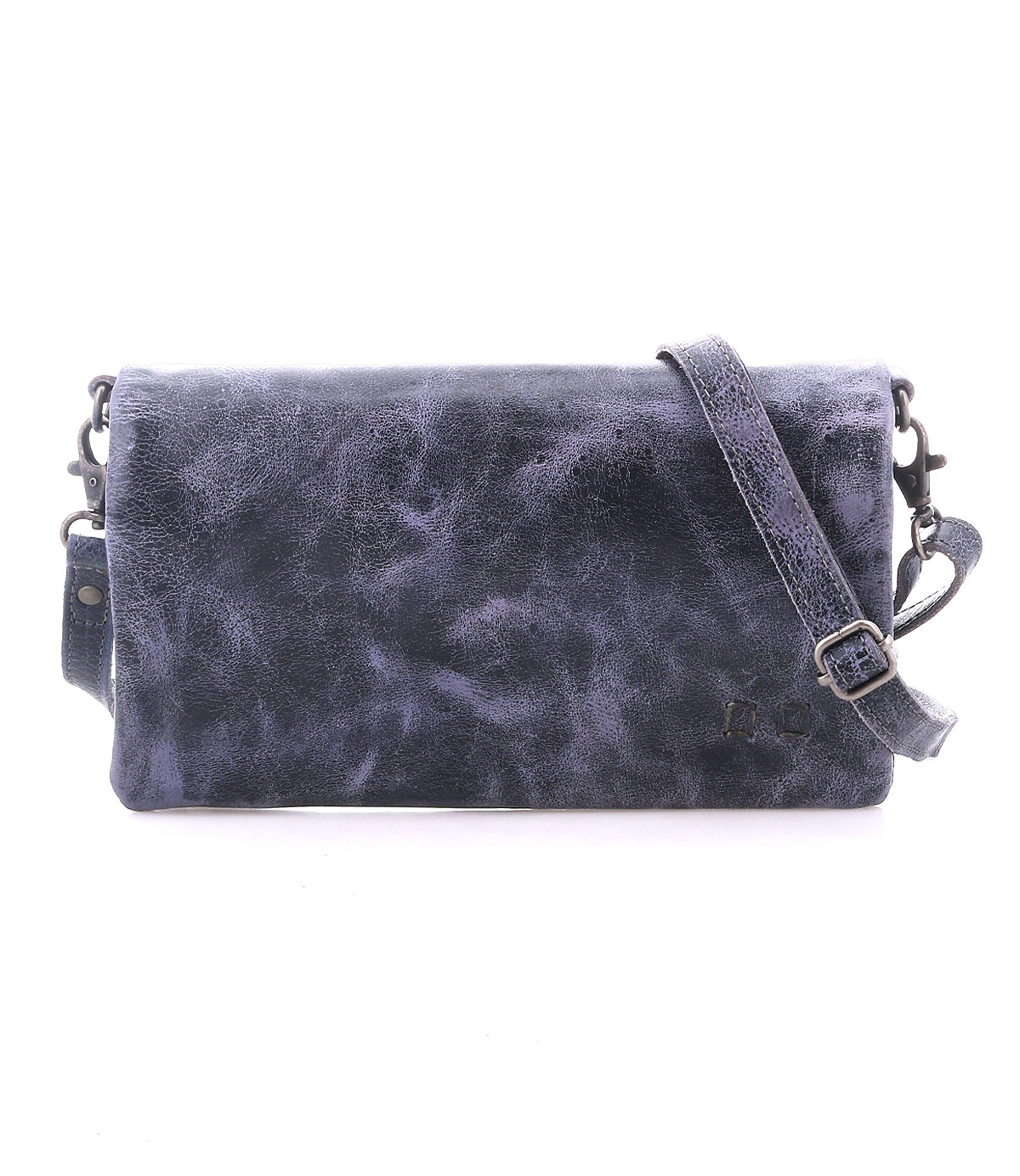 The Cadence by Bed|Stü is a rectangular crossbody clutch in dark blue, crafted from textured vegetable-tanned leather and featuring an adjustable strap, displayed against a white background.