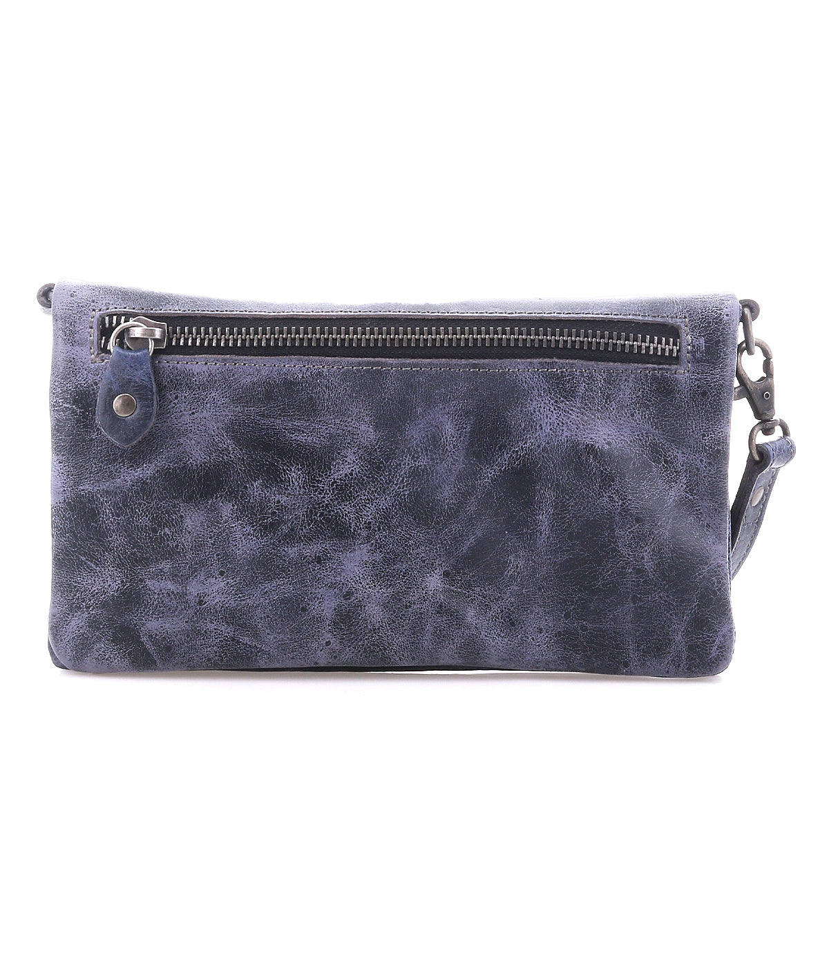 The Cadence by Bed|Stü is a rectangular, dark blue crossbody clutch crafted from vegetable-tanned leather, featuring a front zipper pocket and a detachable strap, shown isolated on a white background.