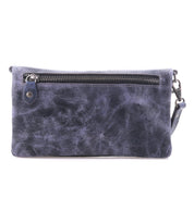 The Cadence by Bed|Stü is a rectangular, dark blue crossbody clutch crafted from vegetable-tanned leather, featuring a front zipper pocket and a detachable strap, shown isolated on a white background.
