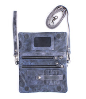 The Cadence by Bed|Stü is a versatile 3-in-1 leather wallet in gray, crafted from premium vegetable-tanned leather. This crossbody clutch features a detachable strap, two zippered pockets, card slots, and secure snap closures. Shown open on a white background.