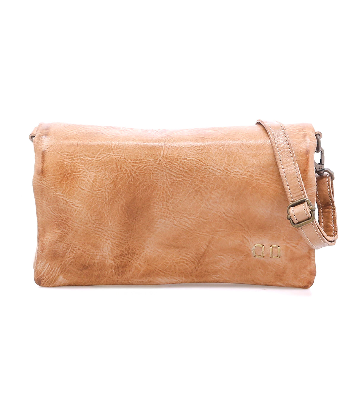 The Cadence crossbody clutch by Bed|Stü is crafted from vegetable-tanned leather in a light brown hue, featuring an adjustable strap and a subtle textured finish, displayed against a white background.