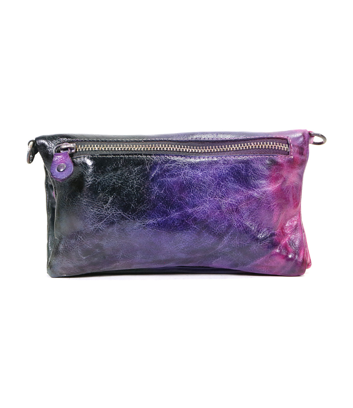 Introducing Cadence by Bed|Stü: a rectangular pouch crafted from vegetable-tanned leather, featuring a zippered top and a zipper pull on the left side. This pouch has a subtly textured surface with a striking gradient of black, purple, and pink hues.
