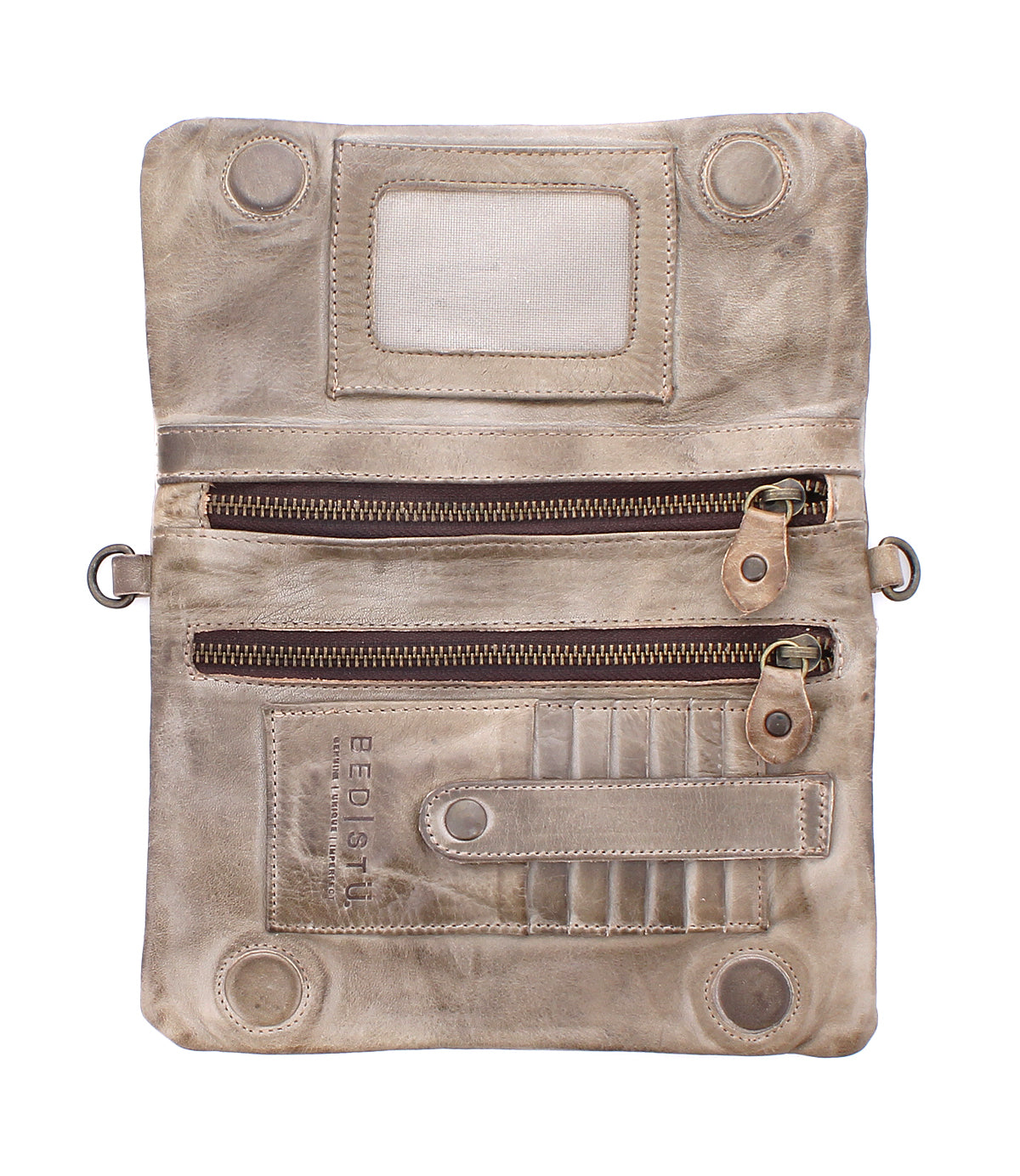Introducing the Cadence by Bed|Stü: an open beige crossbody clutch crafted from vegetable-tanned leather, featuring two zippered pockets, card slots, a snap closure strap, an ID window, and elegant embossed text—this versatile 3-in-1 leather wallet seamlessly blends functionality with timeless style.