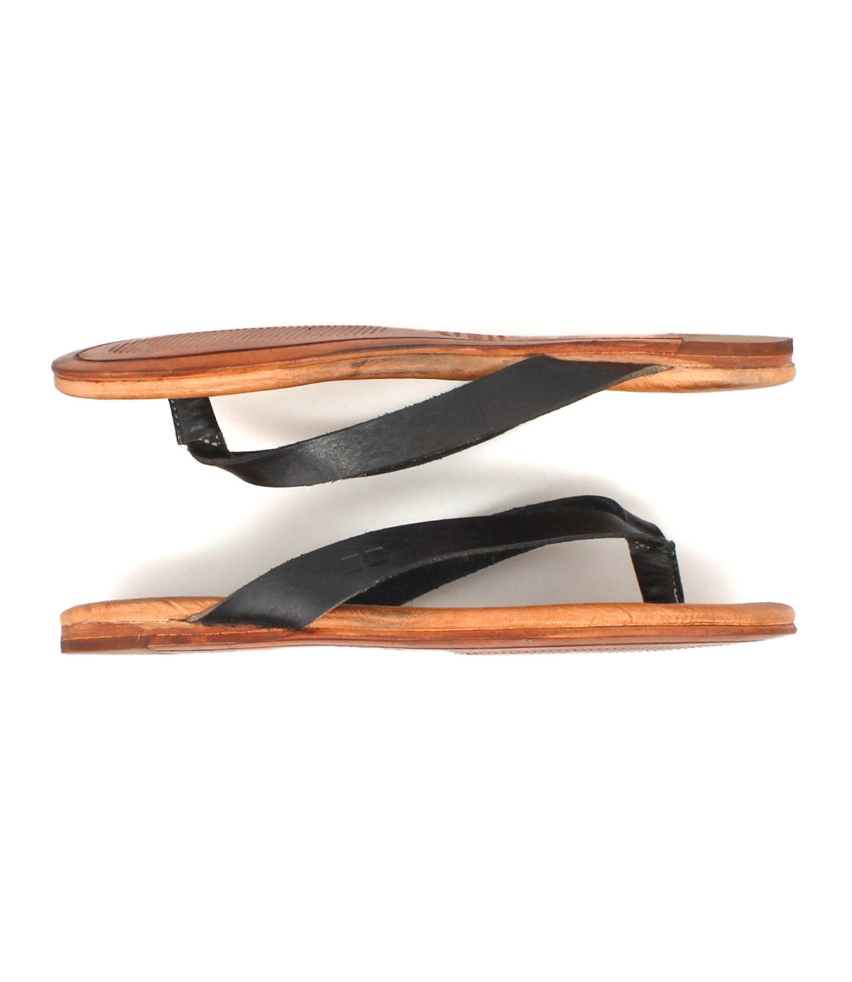 A pair of Bed|Stü Calma lightweight, flat leather sandals featuring tan soles and black leather straps, displayed from the side against a white background.