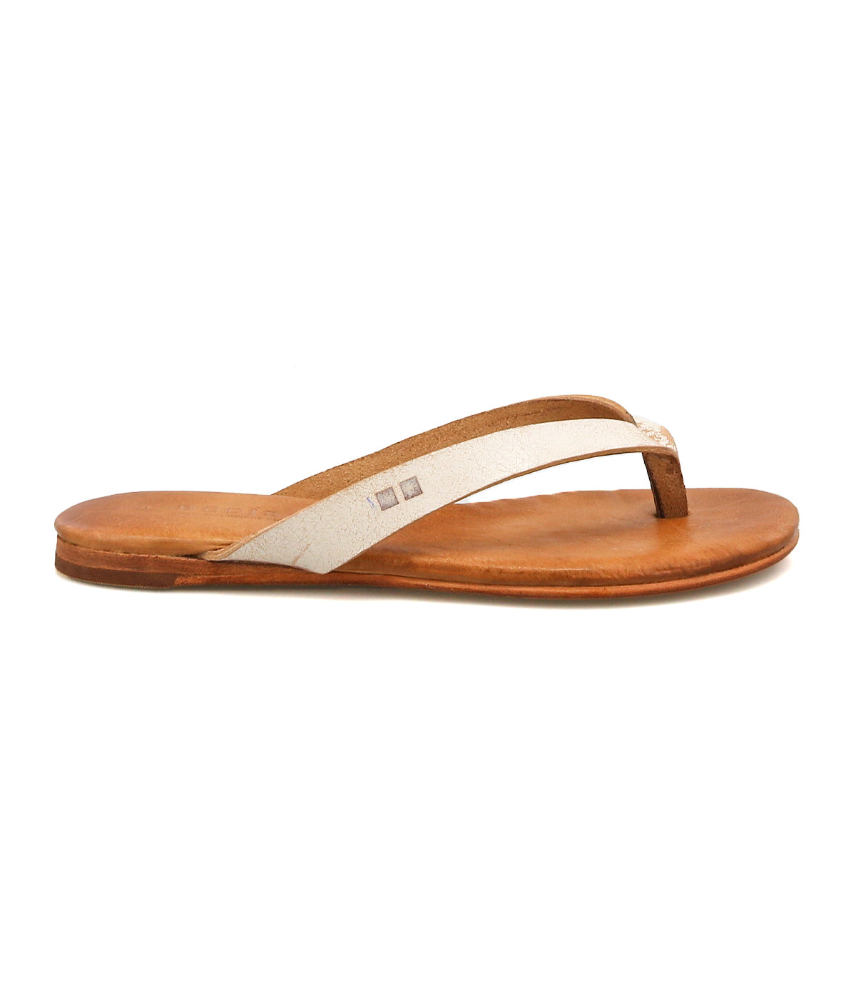 The Calma sandal by Bed|Stü is featured in a side view against a white background, showcasing its lightweight and comfortable design with a brown leather flip-flop base, a thin off-white strap, and a flat sole.