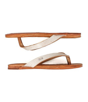 Two lightweight Calma leather sandals by Bed|Stü, featuring tan leather soles and off-white straps, are shown in a side view with one comfortable sandal positioned above the other.