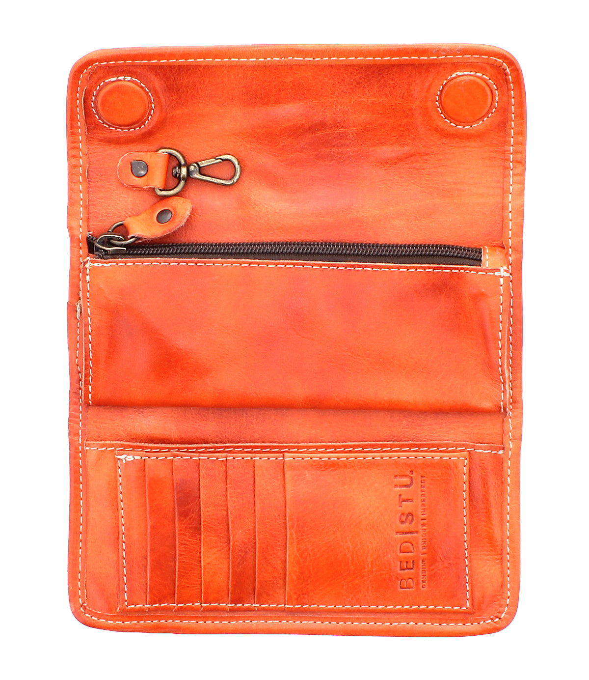 The Bed|Stü Canton is an open orange leather wallet featuring a zippered pocket, key clip, card slots, and signature BED|STU branding; this stylish 2-in-1 clutch is displayed on a white background.
