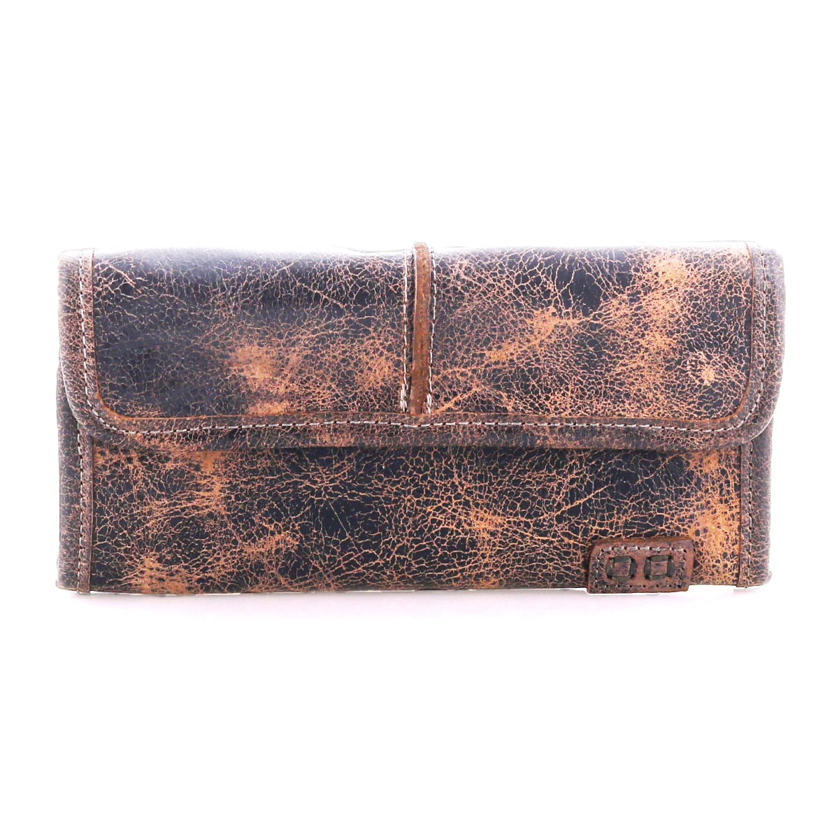 The Bed|Stü Canton is a distressed brown leather wallet featuring a flap closure and a small metal logo plate in the bottom right corner, designed as a versatile 2-in-1 accessory that can also be styled as a clutch for any occasion.