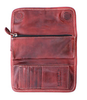 The Bed|Stü Canton wallet is shown open in brown leather, featuring a visible zippered pocket, four card slots, and embossed text. This versatile 2-in-1 clutch is displayed flat to highlight its detailed stitching and secure snap-button closures.