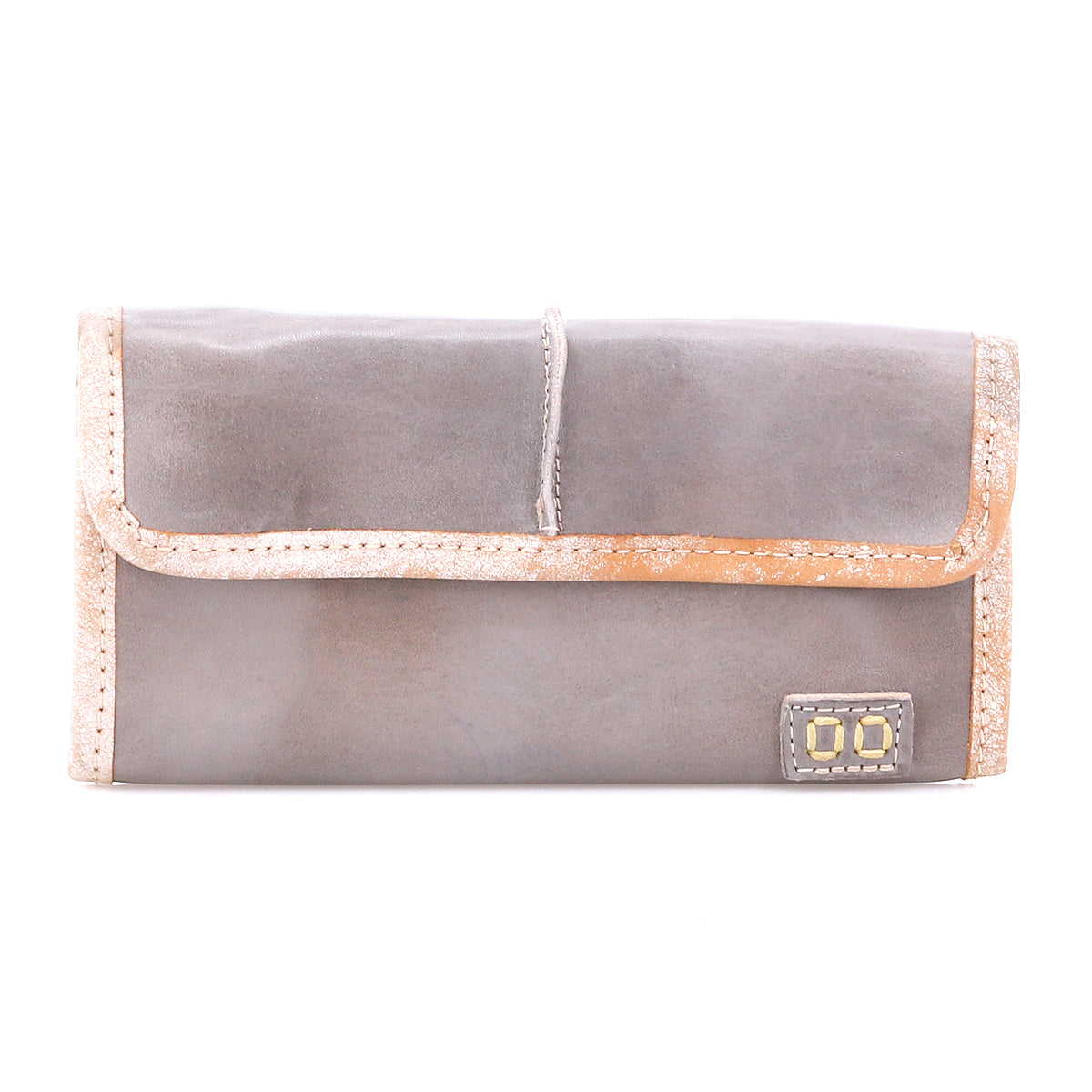 The Bed|Stü Canton is a gray leather wallet featuring a tan trim and a small rectangular patch on the lower right corner, designed as a sleek 2-in-1 clutch, shown against a white background.
