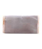 The Bed|Stü Canton is a rectangular gray clutch bag featuring metallic trim on the sides and a versatile 2-in-1 design, shown against a white background.