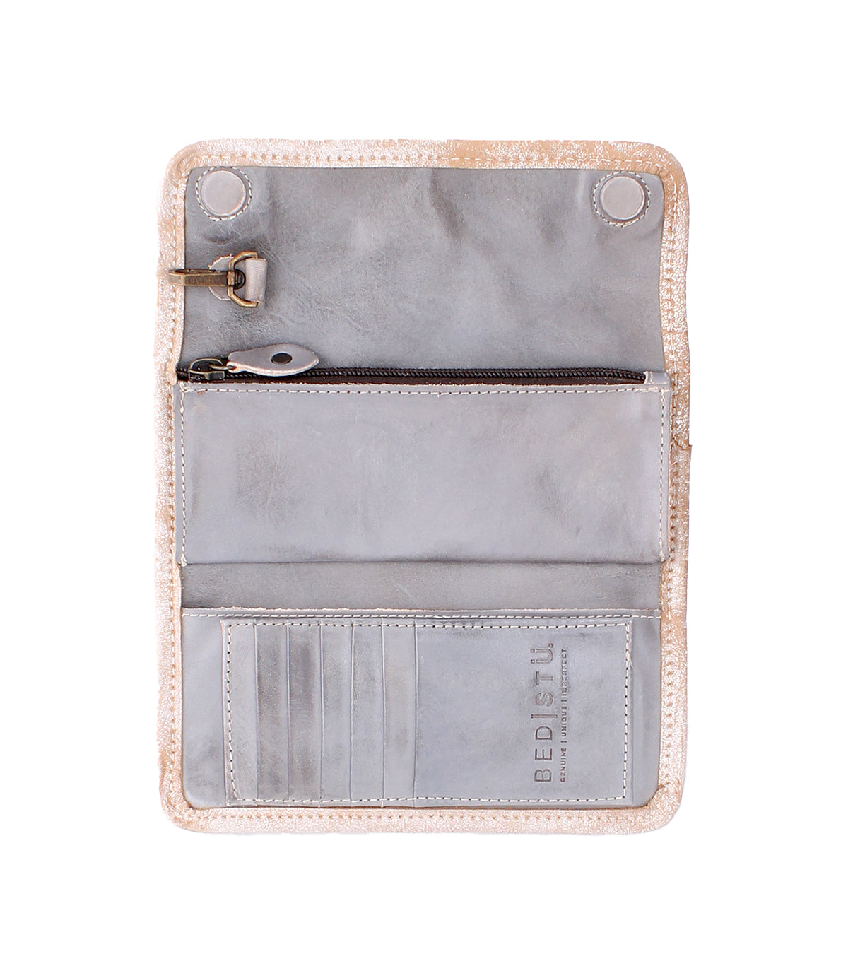 The Bed|Stü Canton wallet, crafted from light gray leather, is open to reveal multiple card slots, a zippered pocket, a snap closure, and distinctive “Bed|Stü” branding on the lower right. This versatile 2-in-1 accessory effortlessly transitions from wallet to clutch, offering both style and functionality in one chic piece.