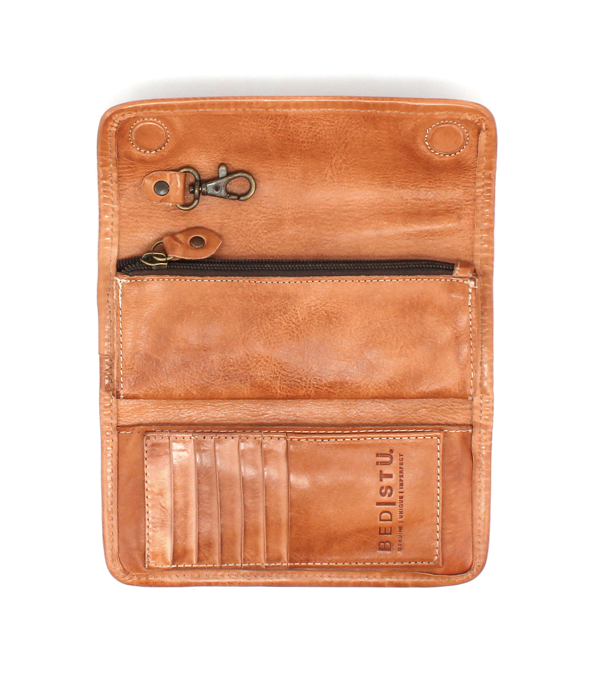 Introducing Canton by Bed|Stü: An open tan leather 2-in-1 wallet featuring multiple card slots, a zippered pocket, convenient hooks, and "Bed|Stü" branding embossed on the lower right—versatile enough to be carried as a stylish clutch.