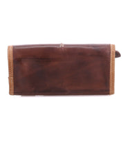 The Bed|Stü Canton is a rectangular brown leather wallet featuring visible stitching around the edges; this stylish 2-in-1 design is showcased against a plain white background.