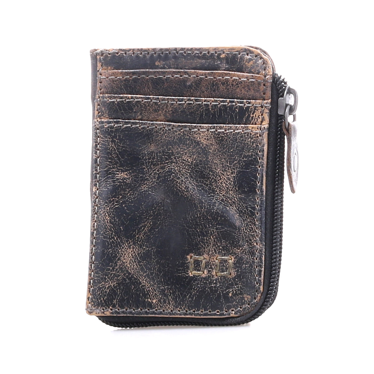 The Bed|Stü Carrie is a compact brown leather wallet featuring visible creases, front card slots, and a zip compartment on the right side, displayed against a white background.