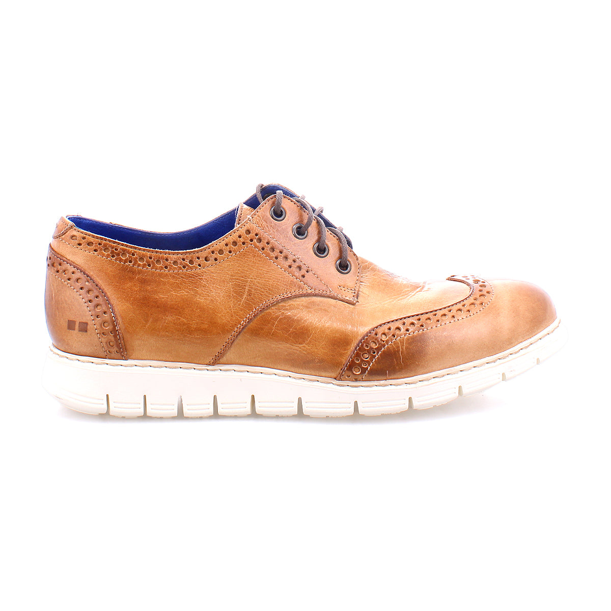 The Cayuga II by Bed|Stü are brown leather derby shoes with classic brogue detailing and a wingtip design, featuring a white rubber sole, blue inner lining, and decorative perforations, shown in profile on a white background.