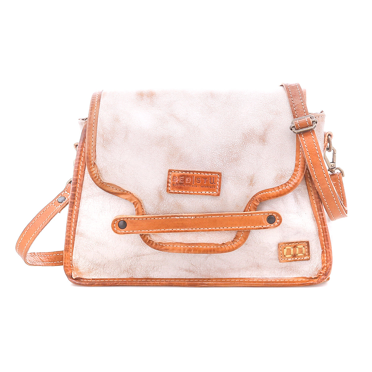 Introducing the Bed|Stü Ceremonious—a beige and brown leather crossbody bag featuring a front flap with vibrant orange trim, a convenient top handle, and an adjustable shoulder strap. This preppy flap-top bag combines effortless style and practicality with its organized interior and secure magnetic closure.
