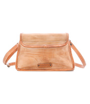 Introducing Ceremonious by Bed|Stü—a light brown preppy leather flap-top bag featuring visible stitching and a long adjustable strap. The magnetic closure keeps your essentials secure, while the thoughtfully organized interior offers a place for everything. The front is adorned with the Bed|Stü brand label.