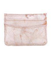 The Chuck wallet by Bed|Stü is a slim, light pink leather design featuring two card slots and visible stitching along the edges, displayed against a white background.