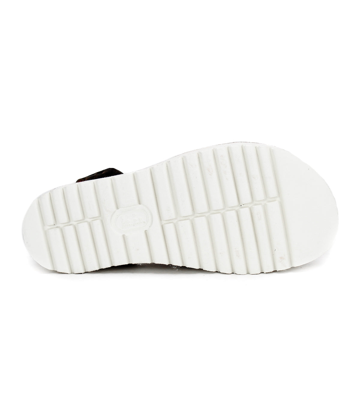 The image displays the bottom view of the Clancy shoe by Bed|Stü, featuring a white sole with a rectangular tread pattern and central branding, emphasizing the supportive design characteristic of platform footwear.