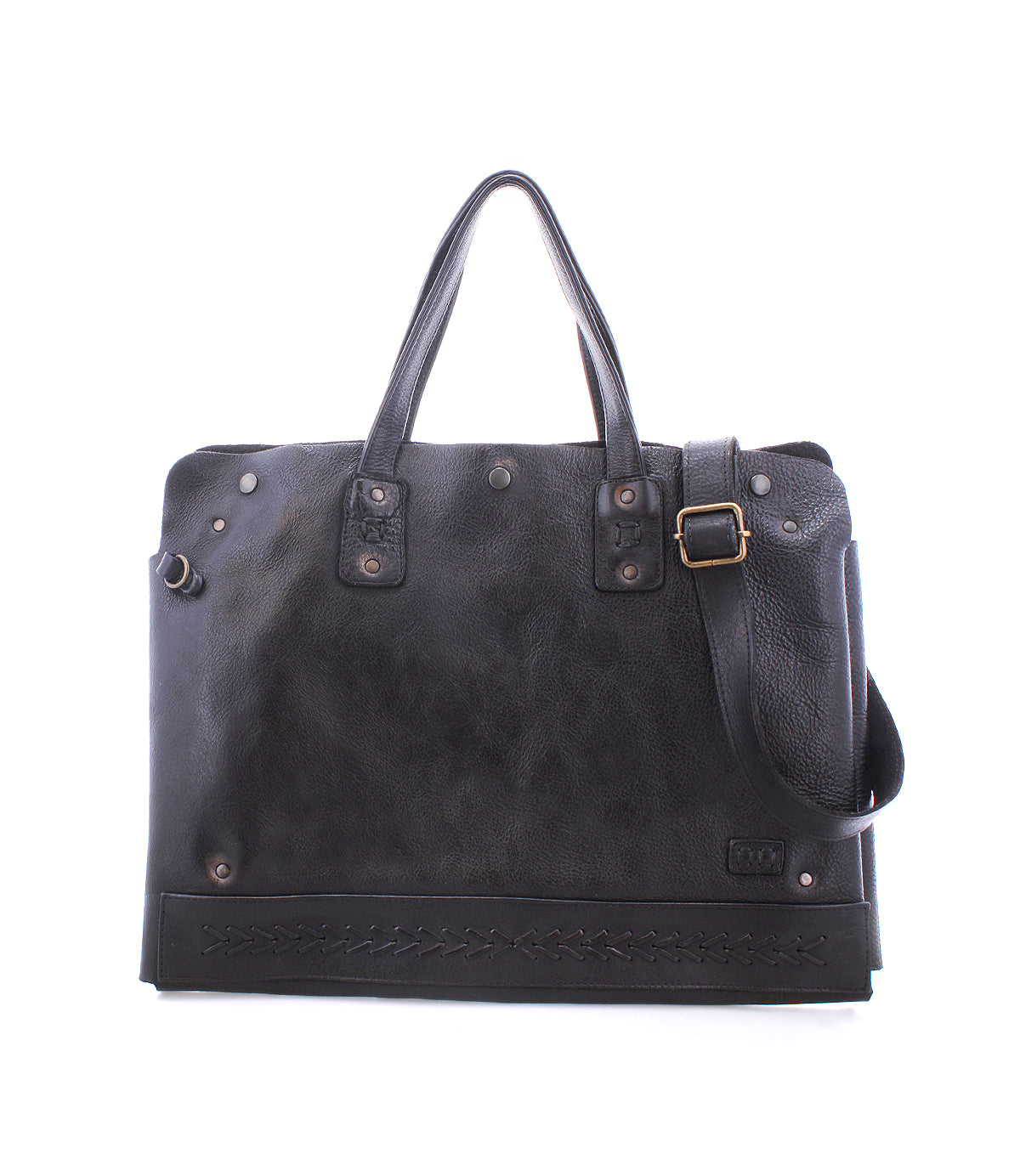 The Bed|Stü Commuter is a black leather bag featuring two handles, an adjustable shoulder strap, metal hardware, and decorative stitching along the bottom edge, displayed against a white background.