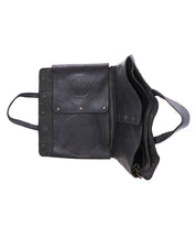 The Bed|Stü Commuter bag, crafted in black leather, is shown from above with its flap open—revealing a roomy main compartment and an inner pocket, making it the ideal mobile office bag for carrying all your essentials.