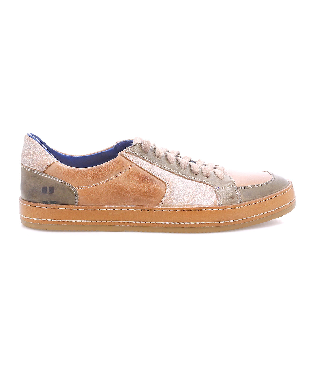 The Bed|Stü Condor is a casual, comfortable leather sneaker featuring a tan, beige, and olive green leather upper, beige laces, and a light brown rubber sole with durable construction. It is shown in side profile on a white background.
