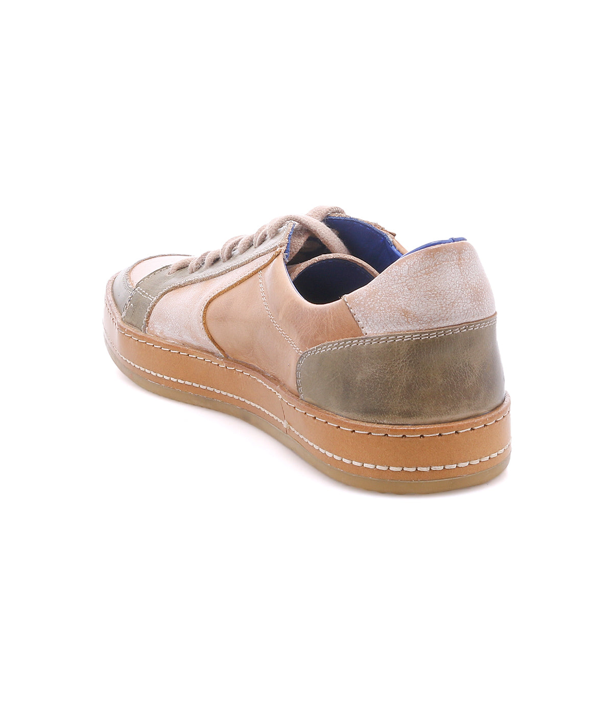 The Bed|Stü Condor is a tan and olive green casual leather sneaker, showcasing durable construction with white stitching, a comfortable brown rubber sole, and matching laces, viewed from the back left on a white background.