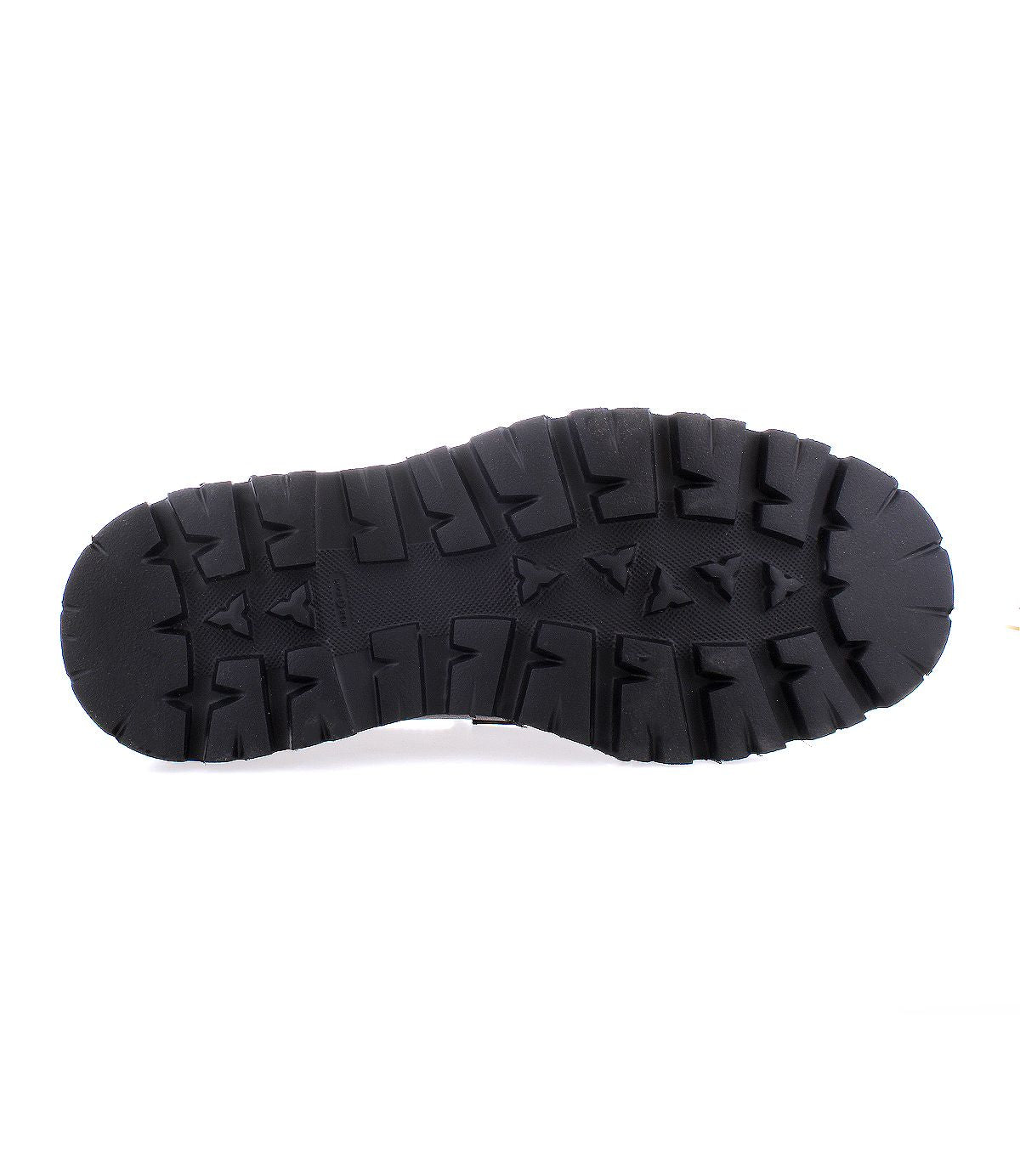 Black rubber Costruito shoe sole by Bed|Stü with deep, rugged treads, viewed from the bottom against a plain white background. This durable, chunky Livetech outsole adds a modern edge to the classic Italian-made penny loafer.