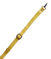 Bed|Stü Crossbody Strap—yellow adjustable leather strap with metal buckle and clasp, ideal as a crossbody accessory or replacement for Bed|Stü bags, shown against a white background.