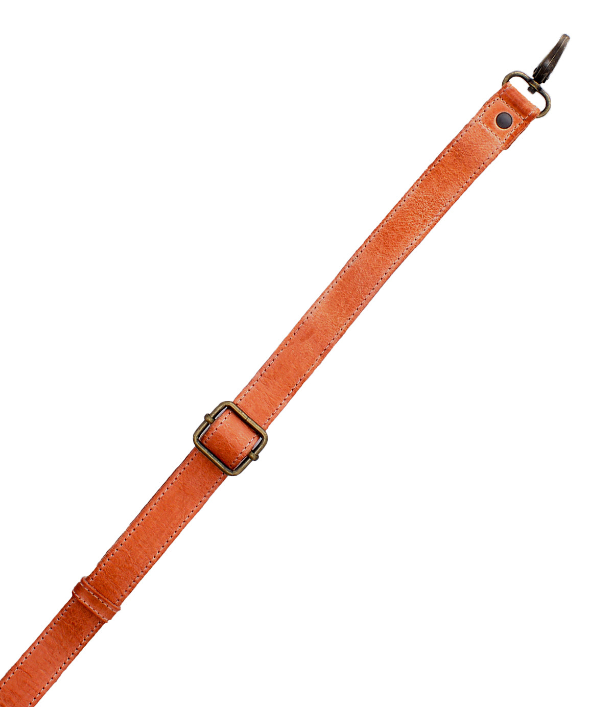The Bed|Stü Crossbody Strap is a brown adjustable leather accessory featuring a metal buckle and clasp, designed for use with Bed|Stü bags, and is displayed diagonally on a white background.