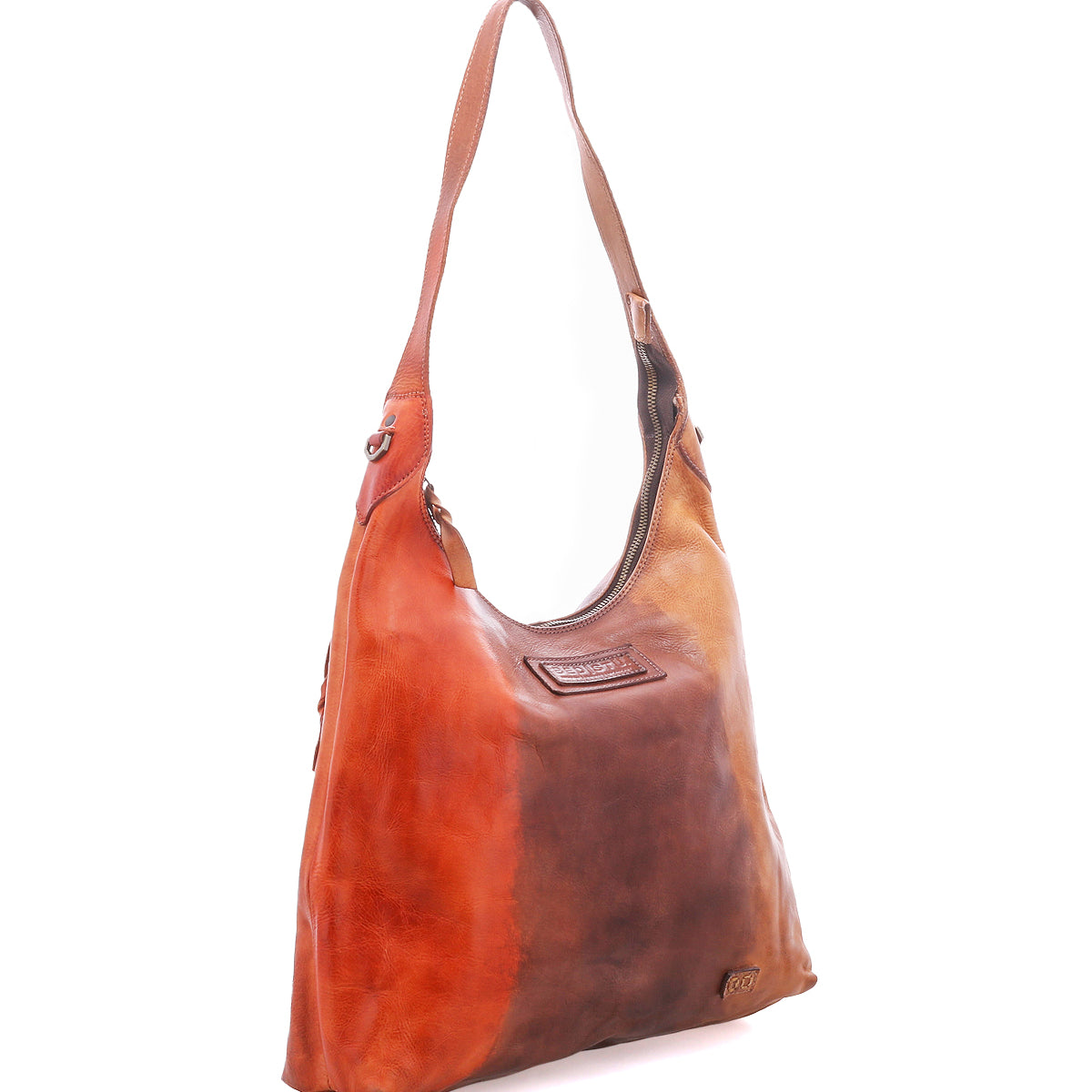 The Dallas LTC by Bed|Stü is a tri-color leather shoulder bag inspired by the classic holster bag silhouette, showcasing shades of orange, brown, and tan. It features a single strap and a soft, slouchy design.