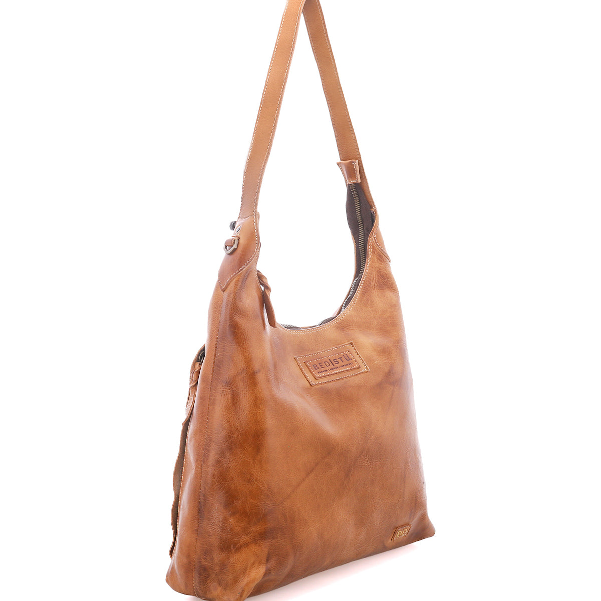 A brown leather shoulder bag with a single strap, stitched details, and a branded patch on the front is shown against a white background—this versatile Bed|Stü Dallas LTC concealed carry bag blends style and security for everyday use.