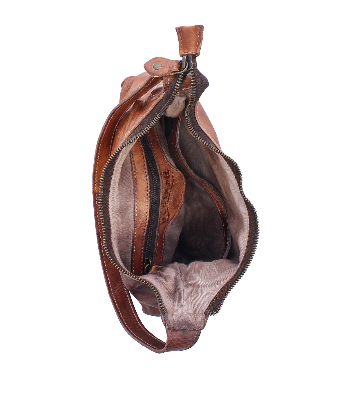The Bed|Stü Denton bag, crafted from brown vegetable-tanned leather, is pictured open from above, displaying its multiple inner pockets and compartments and a zip-top closure along the edge.