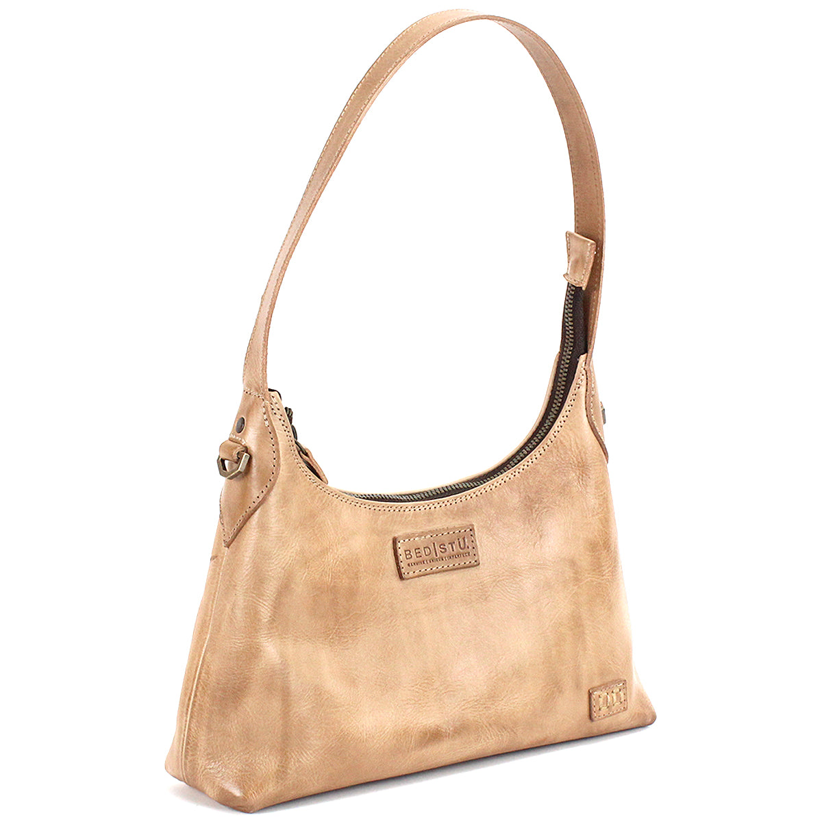 Introducing the Denton by Bed|Stü—a beige leather shoulder bag crafted from premium vegetable-tanned leather. This small bag features a single strap, a zip-top closure, and embossed brand patches on the front, effortlessly blending classic elegance with everyday functionality.