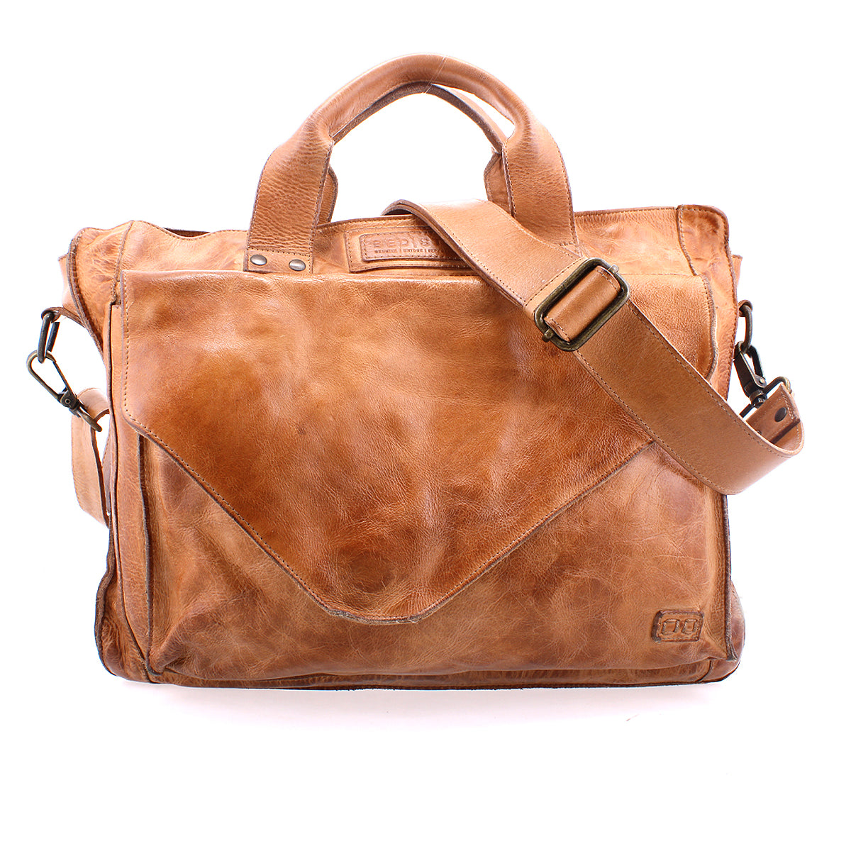 The Bed|Stü Depp messenger bag, crafted in light brown leather, features top handles, an adjustable shoulder strap, a front pocket, visible stitching, and organized compartments—all showcased against a white background.