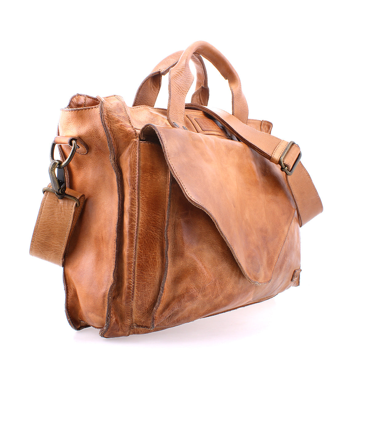 The Bed|Stü Depp is a brown leather messenger bag with top handles, an adjustable shoulder strap, and a front flap pocket. It features organized compartments for easy access to your essentials. Photographed on a white background.