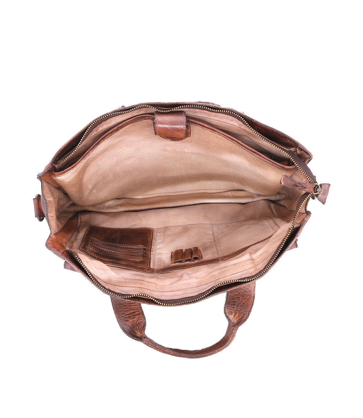 The Bed|Stü Depp handbag in rich brown leather is shown from above, revealing a spacious beige interior with organized compartments—including multiple pockets, pen holders, and a zippered section. Two handles and an adjustable shoulder strap are also visible at the base.