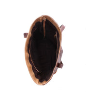 Top view of the open Dome tote bag by Bed|Stü, crafted from brown leather with a dark interior lining and two handles. The spacious main compartment and small internal pocket are visible—ideal for carrying your work essentials thanks to its roomy design.